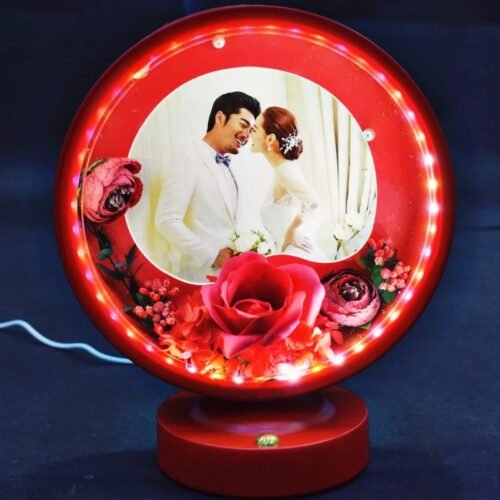 Illuminating heart multitouch photo frame