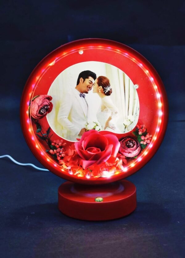 Illuminating heart multitouch photo frame