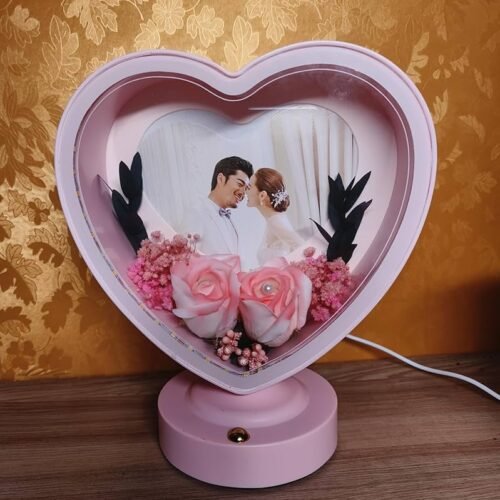 Illuminating heart multitouch photo frame